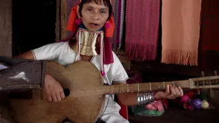 Padaung singer with guitar