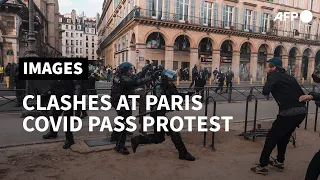 Clashes break out at Paris protest against 'health pass' | AFP