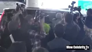 Kendall Jenner in a big crowd of paparazzi arriving to LAX Airport