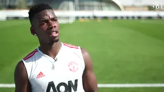 Paul Pogba controls the ball whilst being interviewed