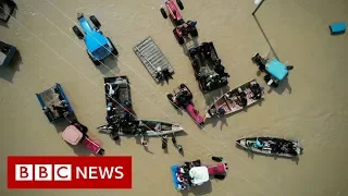 Iran floods: Homes and people swept away - BBC News