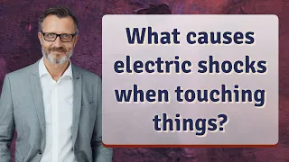 What causes electric shocks when touching things?