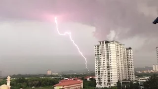 Storm in Subang Jaya, Malaysia - Multiple Lightning Strikes Purple Skies