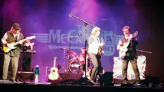 "Can't Buy Me Love", being performed by The McCartney Project,  starring Tony Burlingame