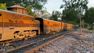 Rio Grande Sky train passing the old water tower, evening sun, g scale