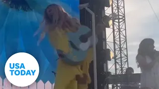 Concertgoers injure performers onstage with thrown objects | USA TODAY