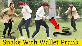 SNAKE WITH PURSE PRANK @ThatWasCrazy