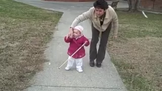 Watch me go!!! Blind preschooler uses cane.