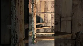 Rustic wooden spiral staircase