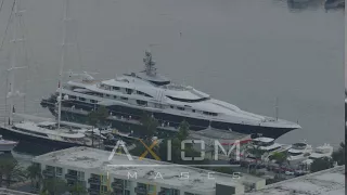 A mega yacht with a helicopter docked in Marina Del Rey, California | AX0156_175