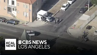 33-year-old woman dead after being pinned against building by car in South LA