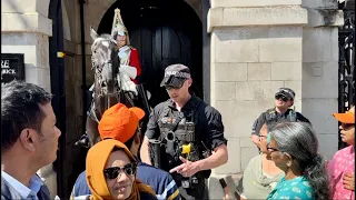 POLICE INTERVENED with a group of tourists & tells them to  BACK OFF As they Crowded the Horse