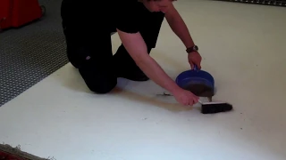 Fine rug cleaning procedure - dusting dirty rugs to remove dirt and grit