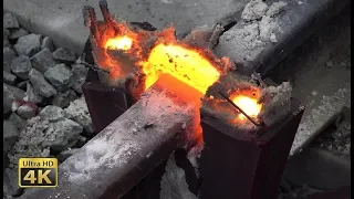 Rails thermite welding - Eruptions, melt squeezing and grinding [4K]