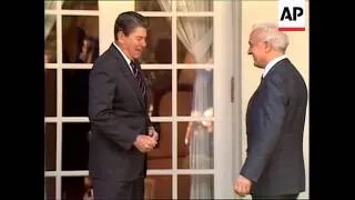 President Ronald Reagan and Soviet Union Foreign Minister Eduard Shevardnadze greet reporters in the