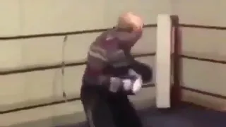 Old man beats up young guy