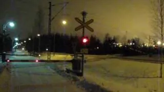 Finnish freight train at Ahlmanintie level crossing