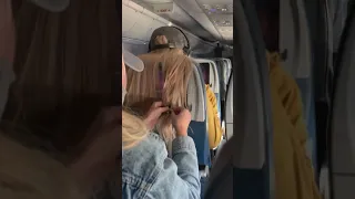 lady puts CHEWING GUM in rude plane passengers hair