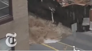 Giant Sinkhole Swallows Car, Road in Ottawa | The New York Times