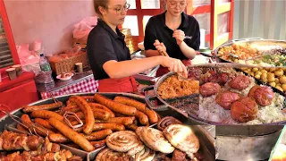 Street Food in Gdansk, Poland. Huge Sausages, Pork Knuckles, Langos, Stuffed Wrap and more