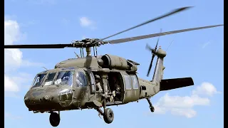 The Sikorsky UH-60 Black Hawk is a four-blade, twin-engine, medium-lift utility military helicopter