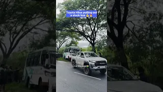 Toyota Hilux pulling out a stuck bus #shorts #toyotahilux