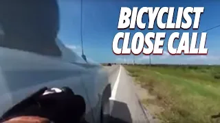 CLOSE CALL: Cyclist nearly knocked off bike by motorist