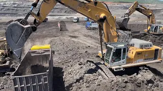 Liebherr 974 Excavator Loading Mercedes And MAN Trucks