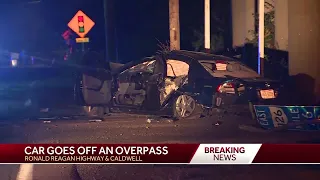 Car goes off overpass on Ronald Reagan Highway
