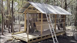 Building an off grid Bathroom Cabin / Shack - Finish the roofing iron and some of the walls.