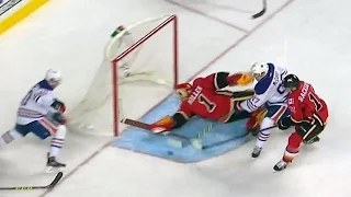 Hiller makes desperation paddle save on McDavid