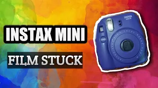 Instax mini film stuck