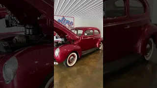 1940 Ford Burgundy Deluxe Sedan with 12V conversion offered by Carolina Classic Cars 336-736-8855