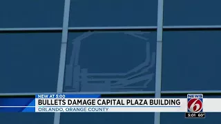 Bullets damage building in downtown Orlando