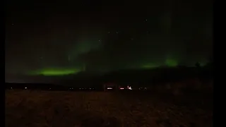 Shooting Star Appears As Northern Lights Dance Across Sky in Iceland