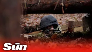 Ukrainian troops train in trenches on Belarus border ready for Russian attack