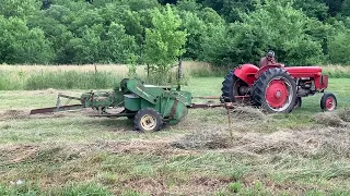 Massey Ferguson 65 pulling a John Deere 14T square baler.