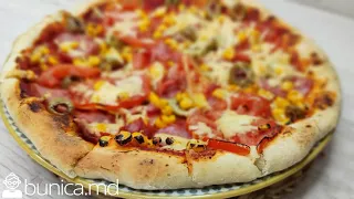 Pizza ca în pizzerie în condiții de casă. Iată cîteva secrete pentru a obține o pizza delicioasă.