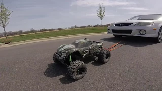 The Traxxas Xmaxx pulls a..REAL CAR??!! (2716lbs I googled it!!)