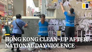 Hong Kong cleans up trail of destruction left from violent protests on China’s National Day