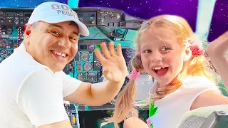 Nastya and Dad pretend to play and learn at the Puerto Rico Children's Science Museum.