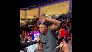 Nate Diaz Throws  Water Bottle at Boxer Chase Demoor.