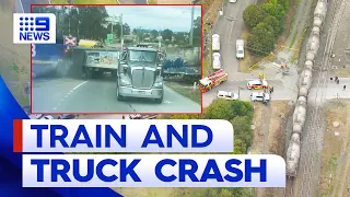 Dashcam shows moment freight train crashes into truck in Sydney | 9 News Australia