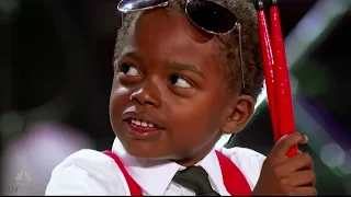 Watch the Amazing Drum kid with the sweetest smile