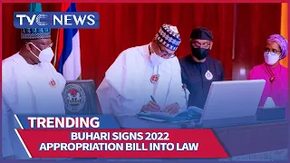 Watch As President Buhari Signs 2022 Appropriation Bill Into Law, Raises Concerns Over Increment