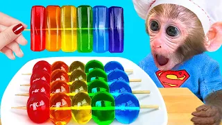 Monkey Baby Bon Bon eats rainbow jelly with ducklings and plays with balloons with puppies