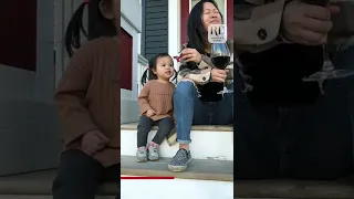 Cute toddler begs mom for chocolate