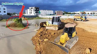 DR51PX KOMATSU Bulldozer Moving Stone & Soil into water, Dump truck unloading