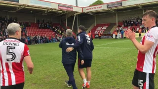 Players, fans and staff celebrate the win that keeps us up!