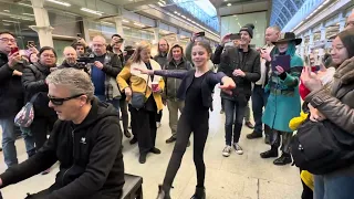 Enjoying the FREE Piano With An Appreciative Crowd